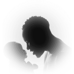 Parent holding baby silhouette